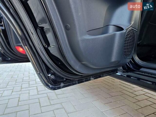 Черный Хендай Туксон, объемом двигателя 1.98 л и пробегом 286 тыс. км за 7300 $, фото 31 на Automoto.ua