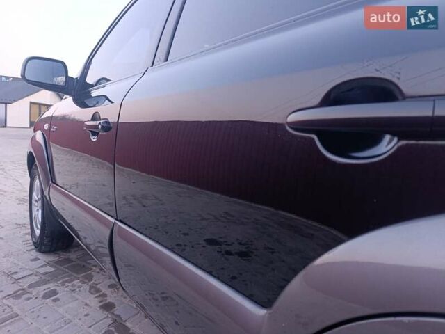 Черный Хендай Туксон, объемом двигателя 2 л и пробегом 280 тыс. км за 9500 $, фото 32 на Automoto.ua
