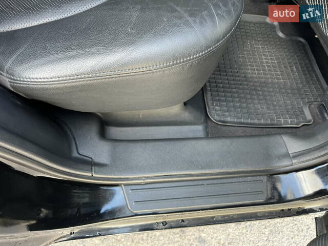 Черный Хендай Туксон, объемом двигателя 2 л и пробегом 256 тыс. км за 7800 $, фото 11 на Automoto.ua