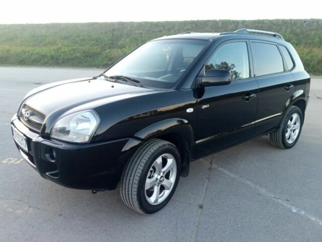 Черный Хендай Туксон, объемом двигателя 2 л и пробегом 240 тыс. км за 2700 $, фото 2 на Automoto.ua