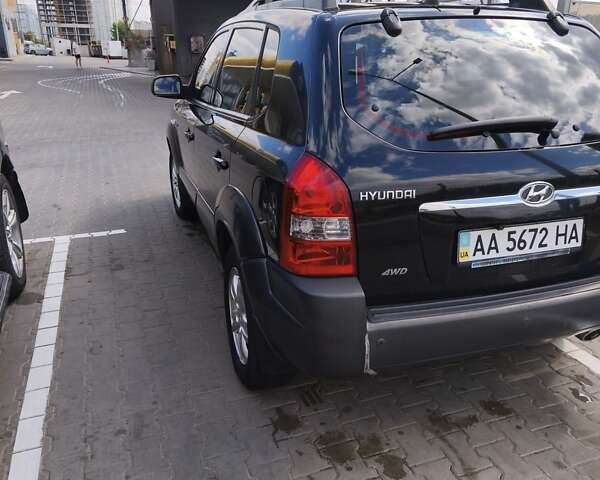 Черный Хендай Туксон, объемом двигателя 2 л и пробегом 158 тыс. км за 7500 $, фото 4 на Automoto.ua