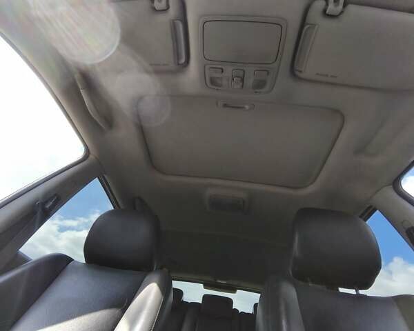 Черный Хендай Туксон, объемом двигателя 2 л и пробегом 158 тыс. км за 7500 $, фото 24 на Automoto.ua
