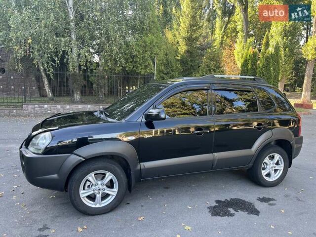 Чорний Хендай Туксон, об'ємом двигуна 1.98 л та пробігом 207 тис. км за 8500 $, фото 7 на Automoto.ua