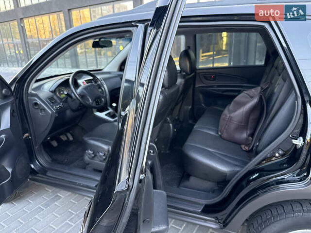 Чорний Хендай Туксон, об'ємом двигуна 1.98 л та пробігом 205 тис. км за 7700 $, фото 26 на Automoto.ua