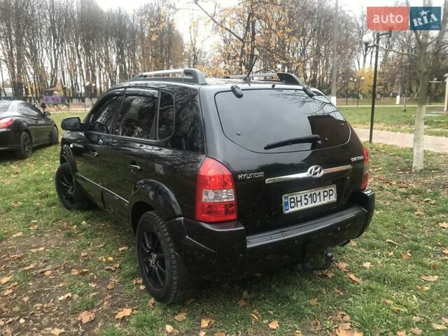 Черный Хендай Туксон, объемом двигателя 2 л и пробегом 210 тыс. км за 8999 $, фото 27 на Automoto.ua