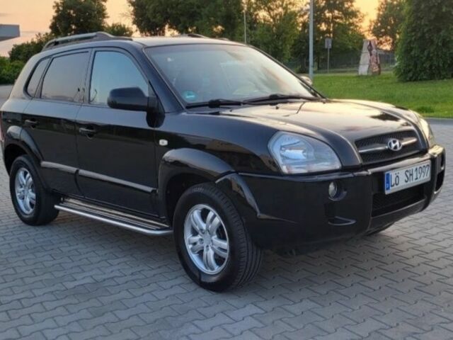 Черный Хендай Туксон, объемом двигателя 2 л и пробегом 232 тыс. км за 1700 $, фото 8 на Automoto.ua