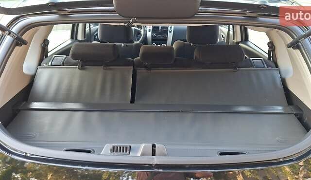 Черный Хендай Туксон, объемом двигателя 2 л и пробегом 190 тыс. км за 8150 $, фото 14 на Automoto.ua