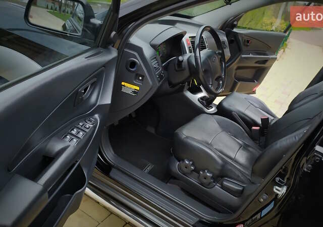 Чорний Хендай Туксон, об'ємом двигуна 2 л та пробігом 229 тис. км за 8600 $, фото 103 на Automoto.ua