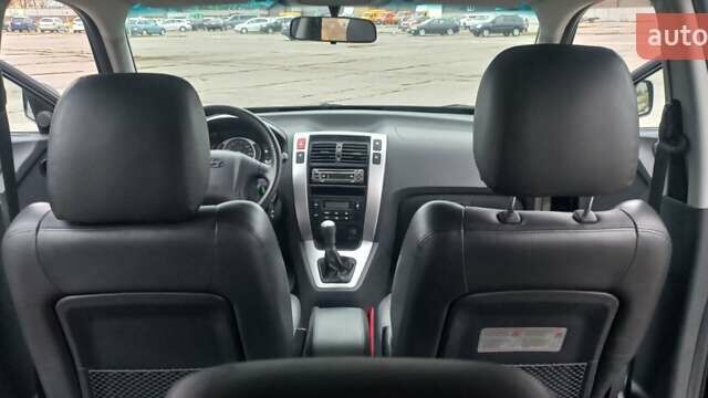 Черный Хендай Туксон, объемом двигателя 1.98 л и пробегом 155 тыс. км за 7999 $, фото 39 на Automoto.ua