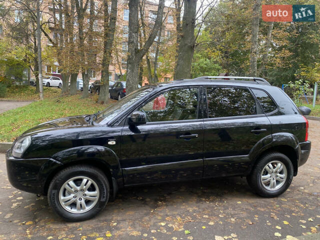 Черный Хендай Туксон, объемом двигателя 2 л и пробегом 178 тыс. км за 7860 $, фото 7 на Automoto.ua