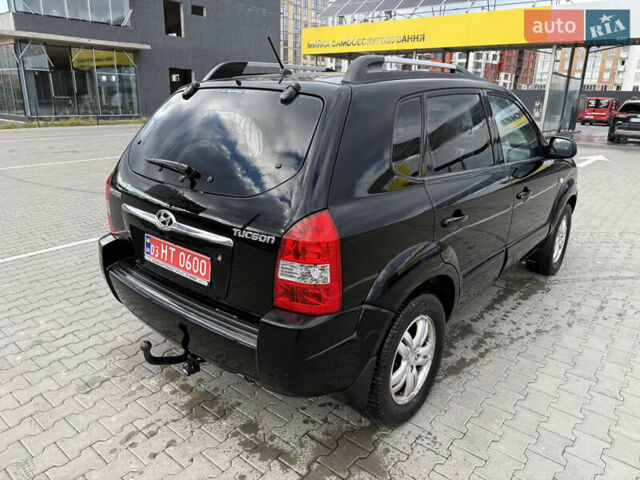 Черный Хендай Туксон, объемом двигателя 2 л и пробегом 182 тыс. км за 6999 $, фото 5 на Automoto.ua