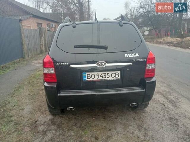 Черный Хендай Туксон, объемом двигателя 1.99 л и пробегом 235 тыс. км за 9000 $, фото 3 на Automoto.ua