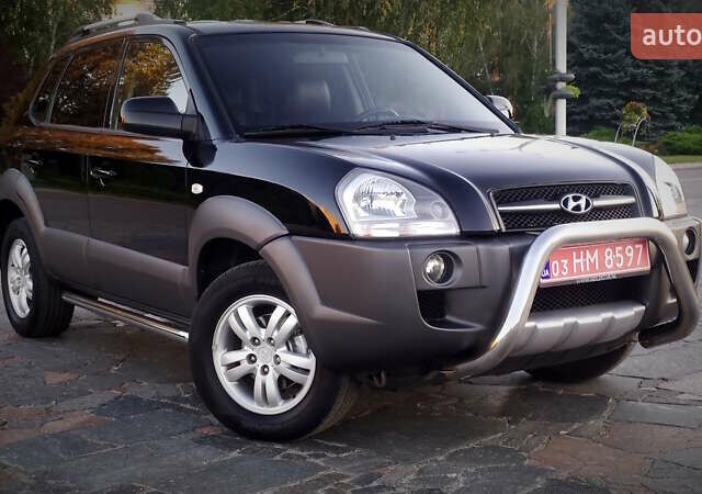 Черный Хендай Туксон, объемом двигателя 2 л и пробегом 230 тыс. км за 8600 $, фото 96 на Automoto.ua