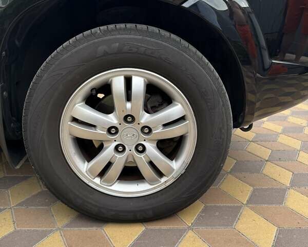 Чорний Хендай Туксон, об'ємом двигуна 1.98 л та пробігом 178 тис. км за 8500 $, фото 3 на Automoto.ua