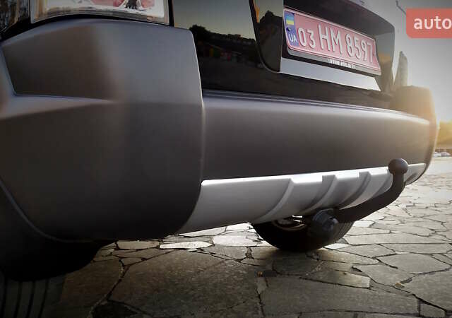 Черный Хендай Туксон, объемом двигателя 2 л и пробегом 230 тыс. км за 8600 $, фото 77 на Automoto.ua