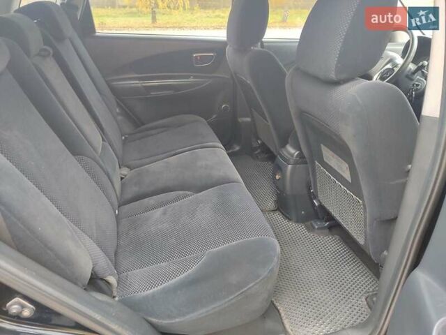 Черный Хендай Туксон, объемом двигателя 2 л и пробегом 270 тыс. км за 6800 $, фото 21 на Automoto.ua