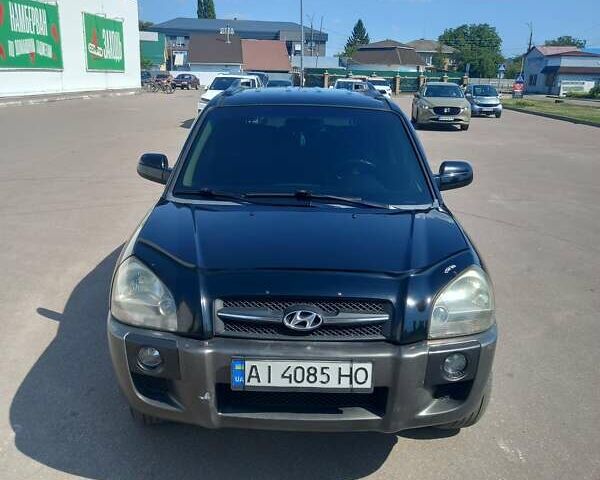 Чорний Хендай Туксон, об'ємом двигуна 1.98 л та пробігом 357 тис. км за 7500 $, фото 4 на Automoto.ua