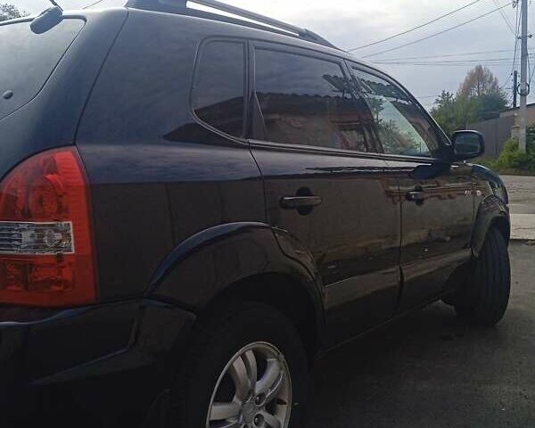 Чорний Хендай Туксон, об'ємом двигуна 1.99 л та пробігом 229 тис. км за 8199 $, фото 10 на Automoto.ua