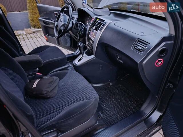 Черный Хендай Туксон, объемом двигателя 2 л и пробегом 280 тыс. км за 9500 $, фото 36 на Automoto.ua