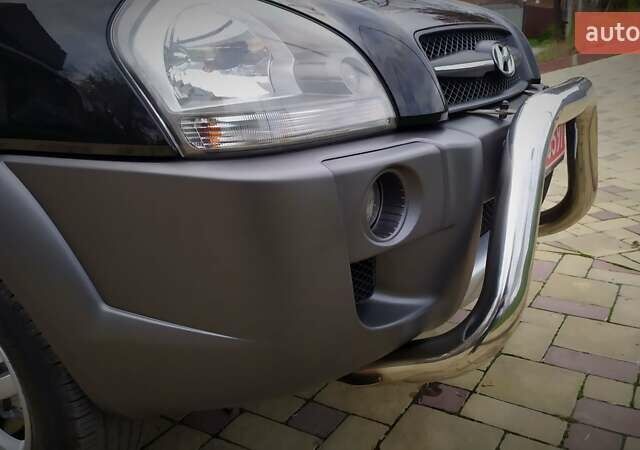 Чорний Хендай Туксон, об'ємом двигуна 2 л та пробігом 229 тис. км за 8600 $, фото 63 на Automoto.ua