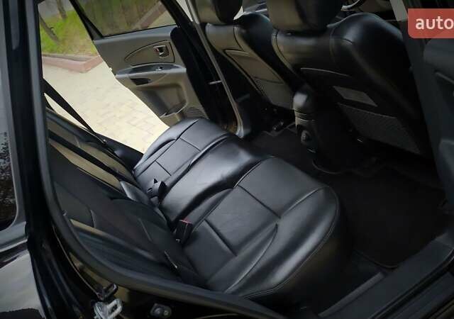 Чорний Хендай Туксон, об'ємом двигуна 2 л та пробігом 229 тис. км за 8600 $, фото 136 на Automoto.ua