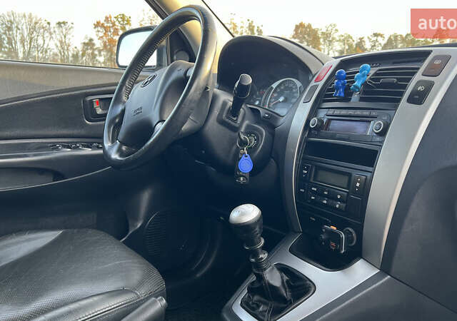 Черный Хендай Туксон, объемом двигателя 1.98 л и пробегом 243 тыс. км за 8500 $, фото 25 на Automoto.ua