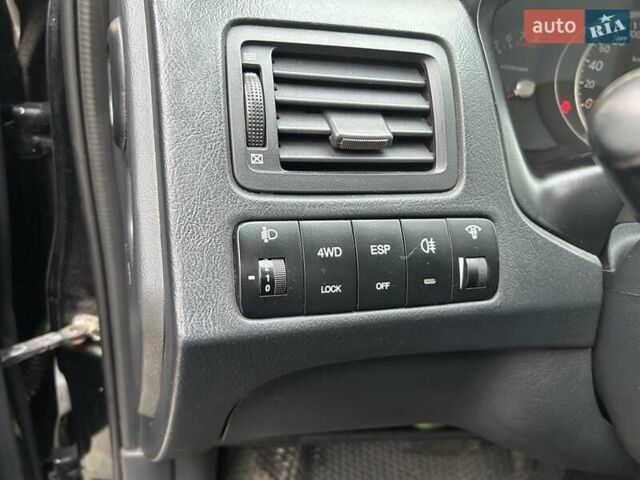 Черный Хендай Туксон, объемом двигателя 1.98 л и пробегом 147 тыс. км за 8000 $, фото 27 на Automoto.ua