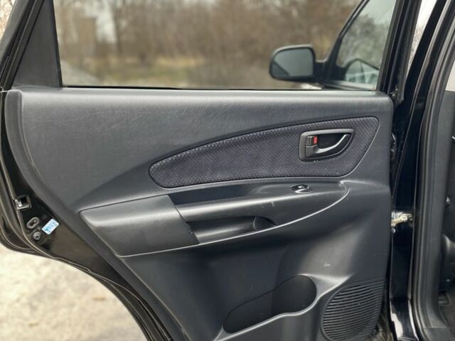 Черный Хендай Туксон, объемом двигателя 2 л и пробегом 330 тыс. км за 4350 $, фото 15 на Automoto.ua