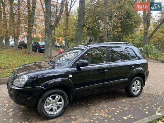 Черный Хендай Туксон, объемом двигателя 2 л и пробегом 178 тыс. км за 7860 $, фото 6 на Automoto.ua