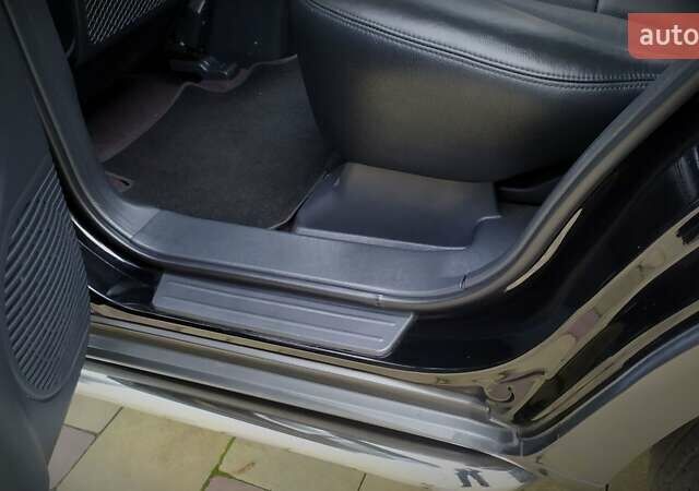 Чорний Хендай Туксон, об'ємом двигуна 2 л та пробігом 229 тис. км за 8600 $, фото 143 на Automoto.ua