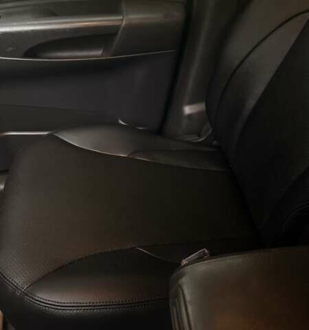 Черный Хендай Туксон, объемом двигателя 1.98 л и пробегом 193 тыс. км за 8000 $, фото 7 на Automoto.ua