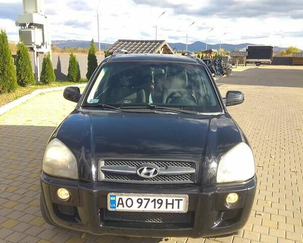 Черный Хендай Туксон, объемом двигателя 2 л и пробегом 277 тыс. км за 7900 $, фото 2 на Automoto.ua