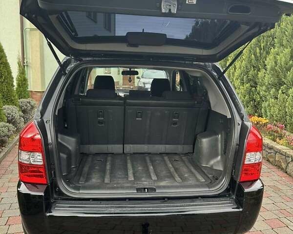 Черный Хендай Туксон, объемом двигателя 2 л и пробегом 218 тыс. км за 7600 $, фото 11 на Automoto.ua