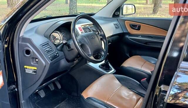 Хендай Туксон 2007 в Сумах на Automoto.ua Черный Хендай Туксон, объемом двигателя 1.98 л и пробегом 236 тыс. км за 7600 $, фото 9 на Automoto.ua