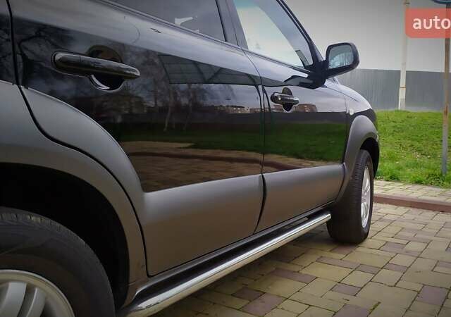 Чорний Хендай Туксон, об'ємом двигуна 2 л та пробігом 229 тис. км за 8600 $, фото 71 на Automoto.ua