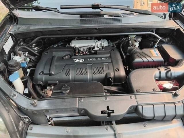 Черный Хендай Туксон, объемом двигателя 1.98 л и пробегом 273 тыс. км за 7400 $, фото 15 на Automoto.ua