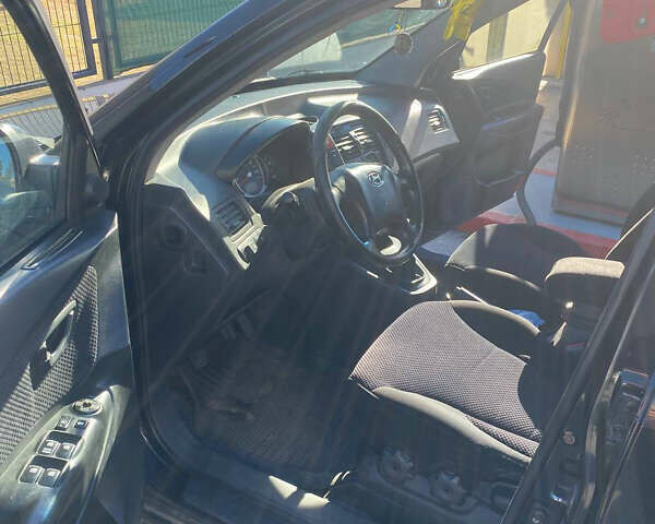 Чорний Хендай Туксон, об'ємом двигуна 1.98 л та пробігом 215 тис. км за 7540 $, фото 5 на Automoto.ua