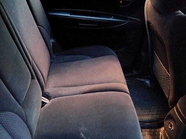 Черный Хендай Туксон, объемом двигателя 2 л и пробегом 270 тыс. км за 7400 $, фото 4 на Automoto.ua