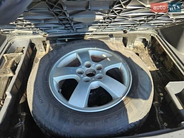 Черный Хендай Туксон, объемом двигателя 2 л и пробегом 152 тыс. км за 7950 $, фото 10 на Automoto.ua
