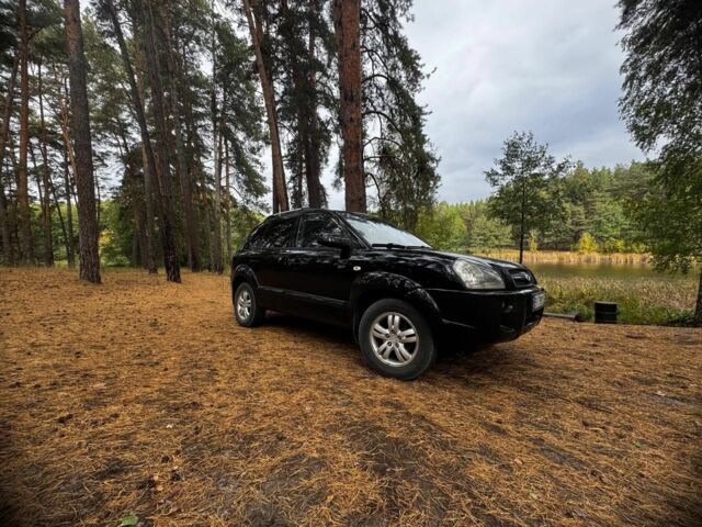 Черный Хендай Туксон, объемом двигателя 2 л и пробегом 240 тыс. км за 8800 $, фото 4 на Automoto.ua