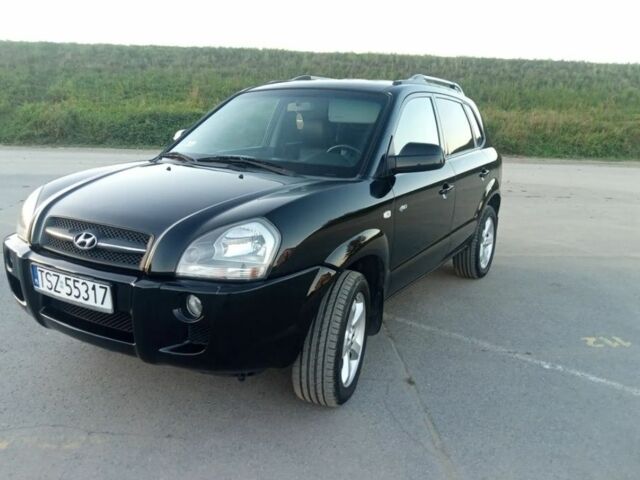 Черный Хендай Туксон, объемом двигателя 2 л и пробегом 240 тыс. км за 2700 $, фото 6 на Automoto.ua