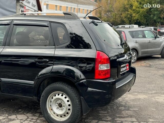 Черный Хендай Туксон, объемом двигателя 2 л и пробегом 177 тыс. км за 8940 $, фото 9 на Automoto.ua