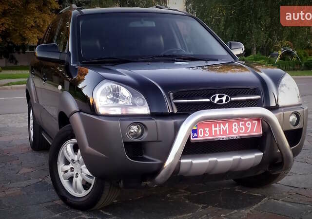 Черный Хендай Туксон, объемом двигателя 2 л и пробегом 230 тыс. км за 8600 $, фото 93 на Automoto.ua