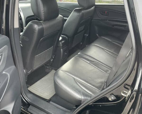 Чорний Хендай Туксон, об'ємом двигуна 2 л та пробігом 162 тис. км за 7500 $, фото 9 на Automoto.ua