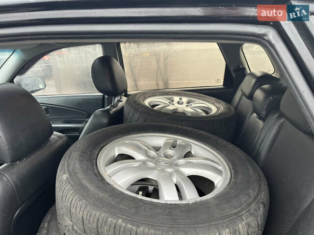 Чорний Хендай Туксон, об'ємом двигуна 1.98 л та пробігом 177 тис. км за 8500 $, фото 8 на Automoto.ua