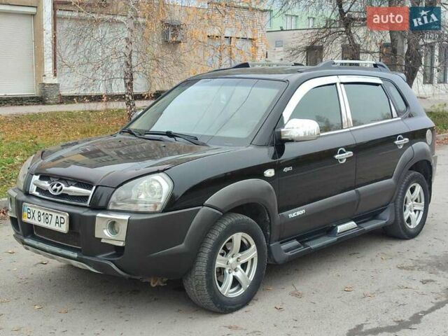 Черный Хендай Туксон, объемом двигателя 2 л и пробегом 270 тыс. км за 6800 $, фото 1 на Automoto.ua