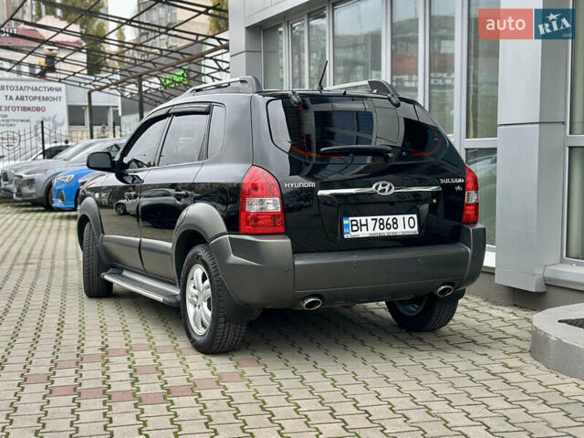 Чорний Хендай Туксон, об'ємом двигуна 2.66 л та пробігом 145 тис. км за 8900 $, фото 2 на Automoto.ua