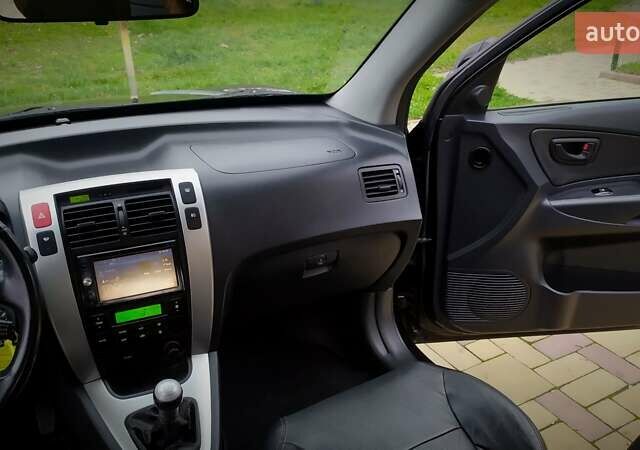 Чорний Хендай Туксон, об'ємом двигуна 2 л та пробігом 229 тис. км за 8600 $, фото 114 на Automoto.ua