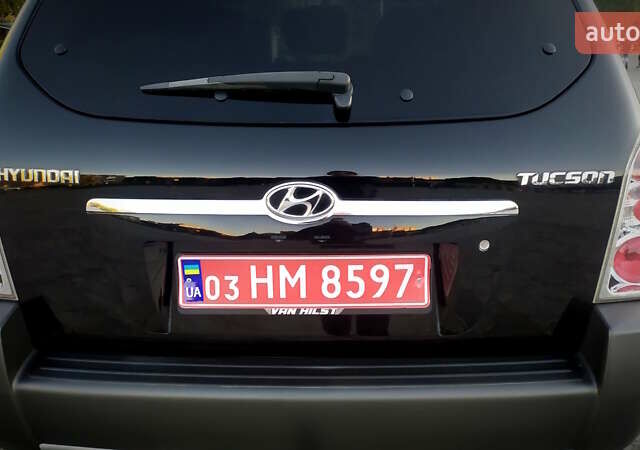 Черный Хендай Туксон, объемом двигателя 2 л и пробегом 230 тыс. км за 8600 $, фото 72 на Automoto.ua