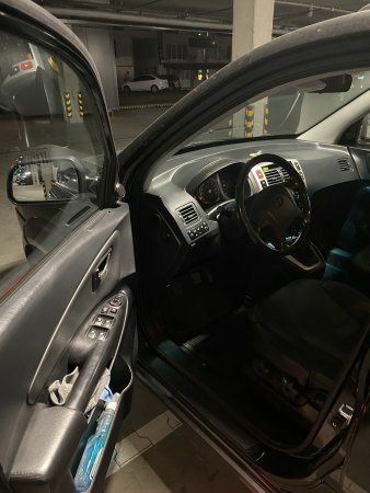 Черный Хендай Туксон, объемом двигателя 2 л и пробегом 305 тыс. км за 8000 $, фото 6 на Automoto.ua